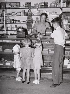 Image of Mormon children buying candy at store. Mendon, Utah