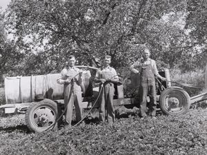 Image of Members of (FSA) Farm Security Administration)  cooperative sprayer. Cache County, Utah